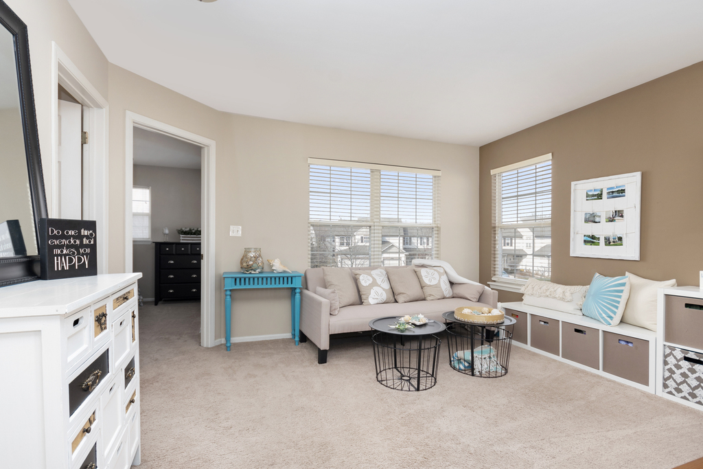 2935 Gypsum Circle Naperville, IL 60564 - Photo 14 of 34 a living room with furniture and a fireplace