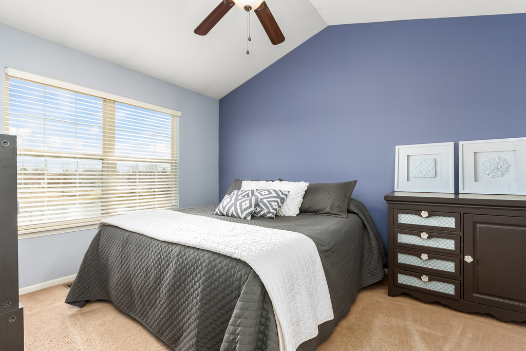2935 Gypsum Circle Naperville, IL 60564 - Photo 17 of 34 a bedroom with a bed and a cabinets