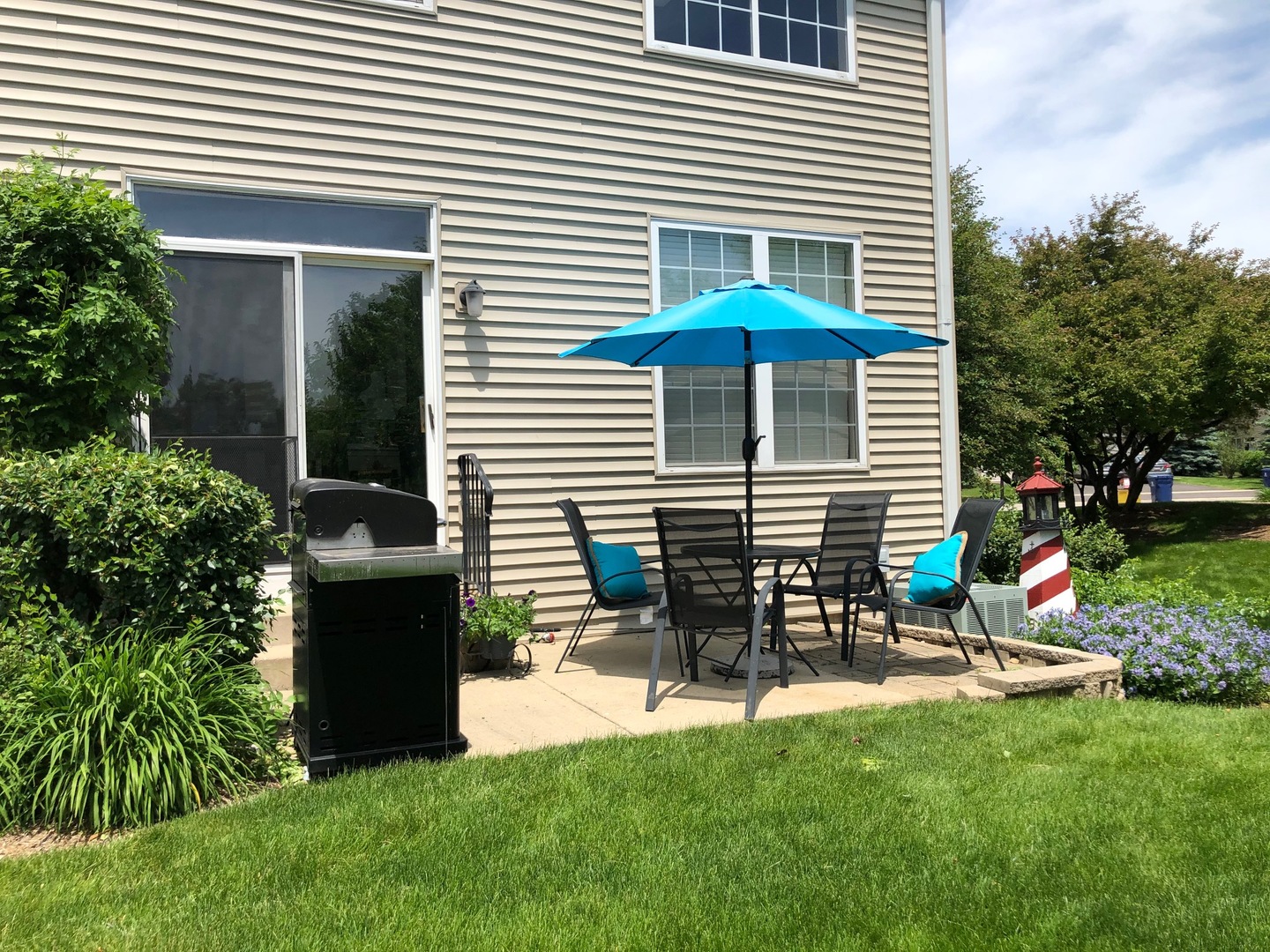2935 Gypsum Circle Naperville, IL 60564 - Photo 30 of 34 a view of a chair and table in backyard of the house
