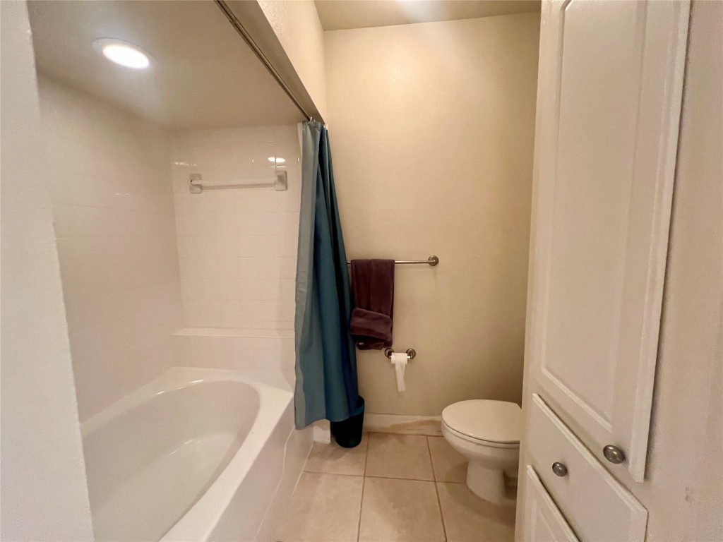 7701 Rialto Boulevard, Unit 1328 Austin, TX 78735 - Photo 11 of 17 Full bathroom featuring shower / tub combo, tile patterned flooring, and recessed lighting