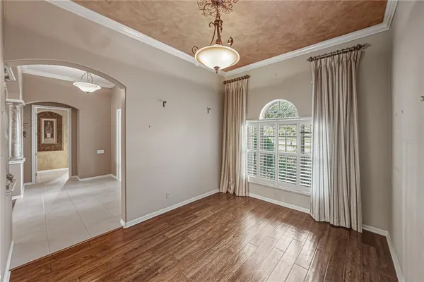 a kitchen with stainless steel appliances granite countertop a sink and a refrigerator