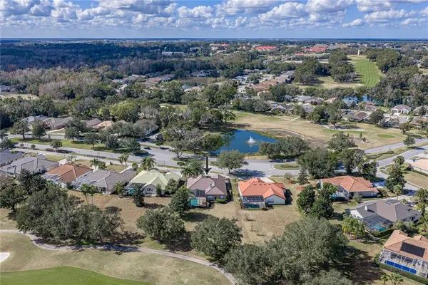an aerial view of a house with outdoor space