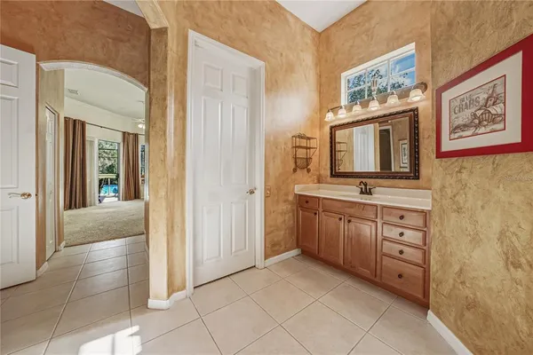 a view of a kitchen with a sink and dishwasher next to a window