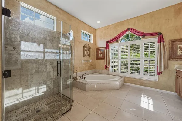 a house view with a seating space and garden