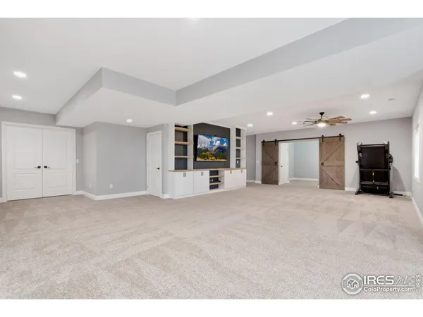 a view of a big room with a large window