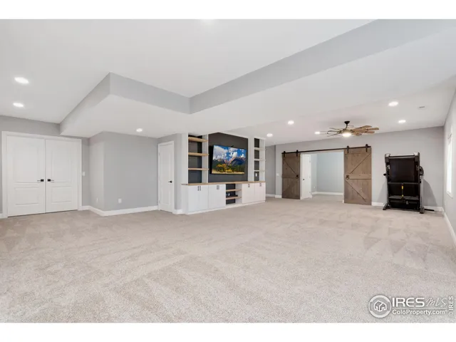 a view of a big room with a large window