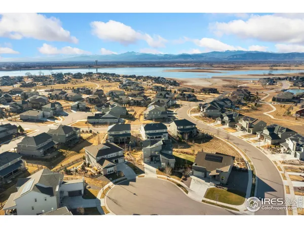 an aerial view of residential building with ocean view