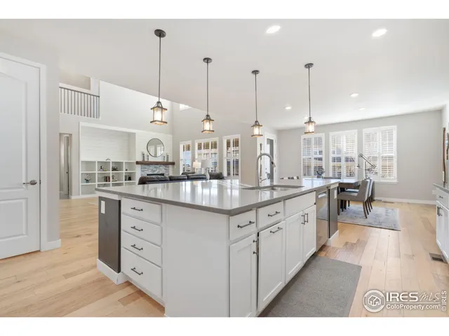 a kitchen with counter top space and sink