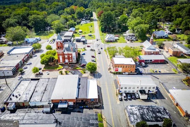 a view of a balcony with wooden floor