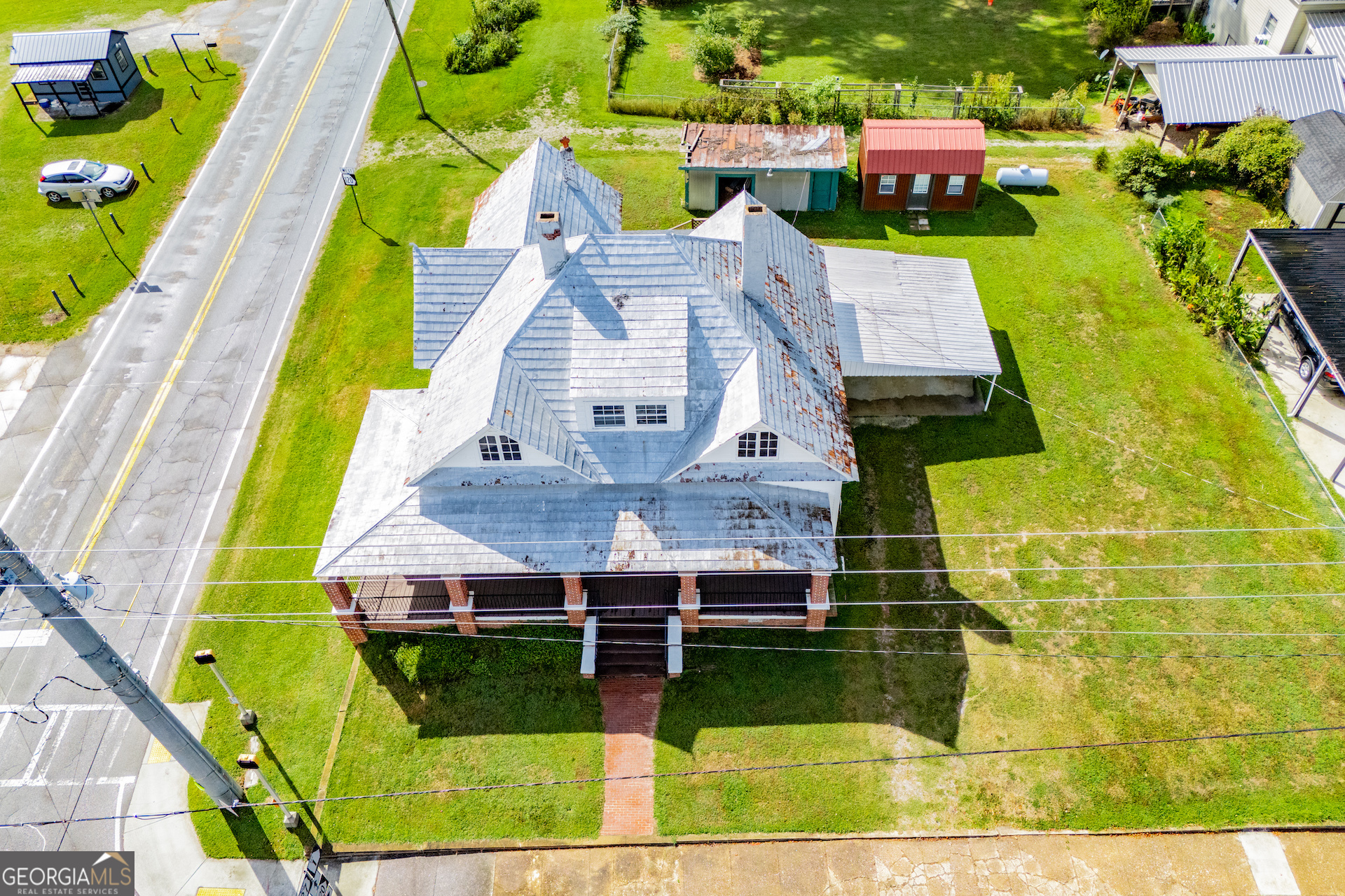 3608 Us Highway Buchanan, GA 30113 - Photo 14 of 92 an aerial view of a house with a yard