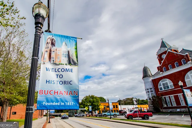 a view of a house with a yard porch and sitting area