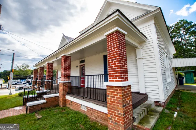 a bathroom with a toilet and a sink