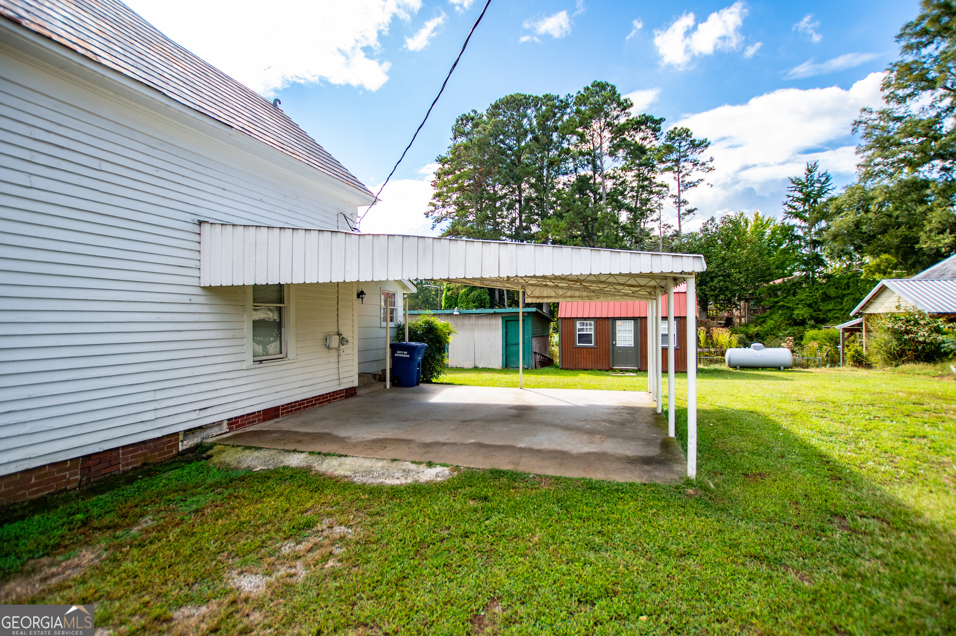 3608 Us Highway Buchanan, GA 30113 - Photo 25 of 92 a view of a house with backyard and a tree