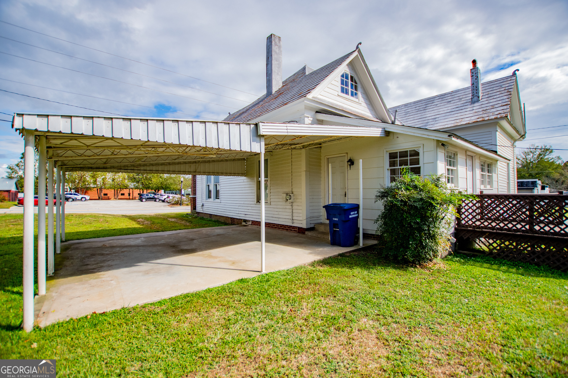 3608 Us Highway Buchanan, GA 30113 - Photo 28 of 92 a view of a house with a swimming pool and a yard