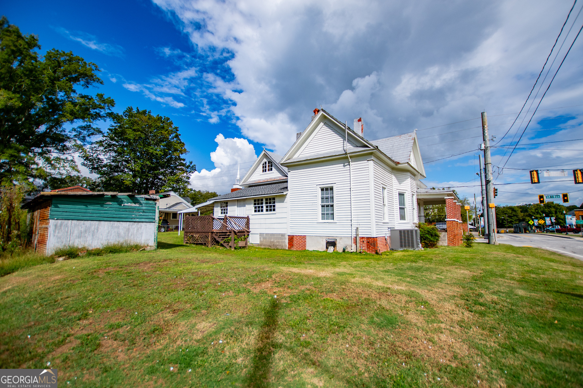 3608 Us Highway Buchanan, GA 30113 - Photo 32 of 92 a view of a house with a yard and sitting area