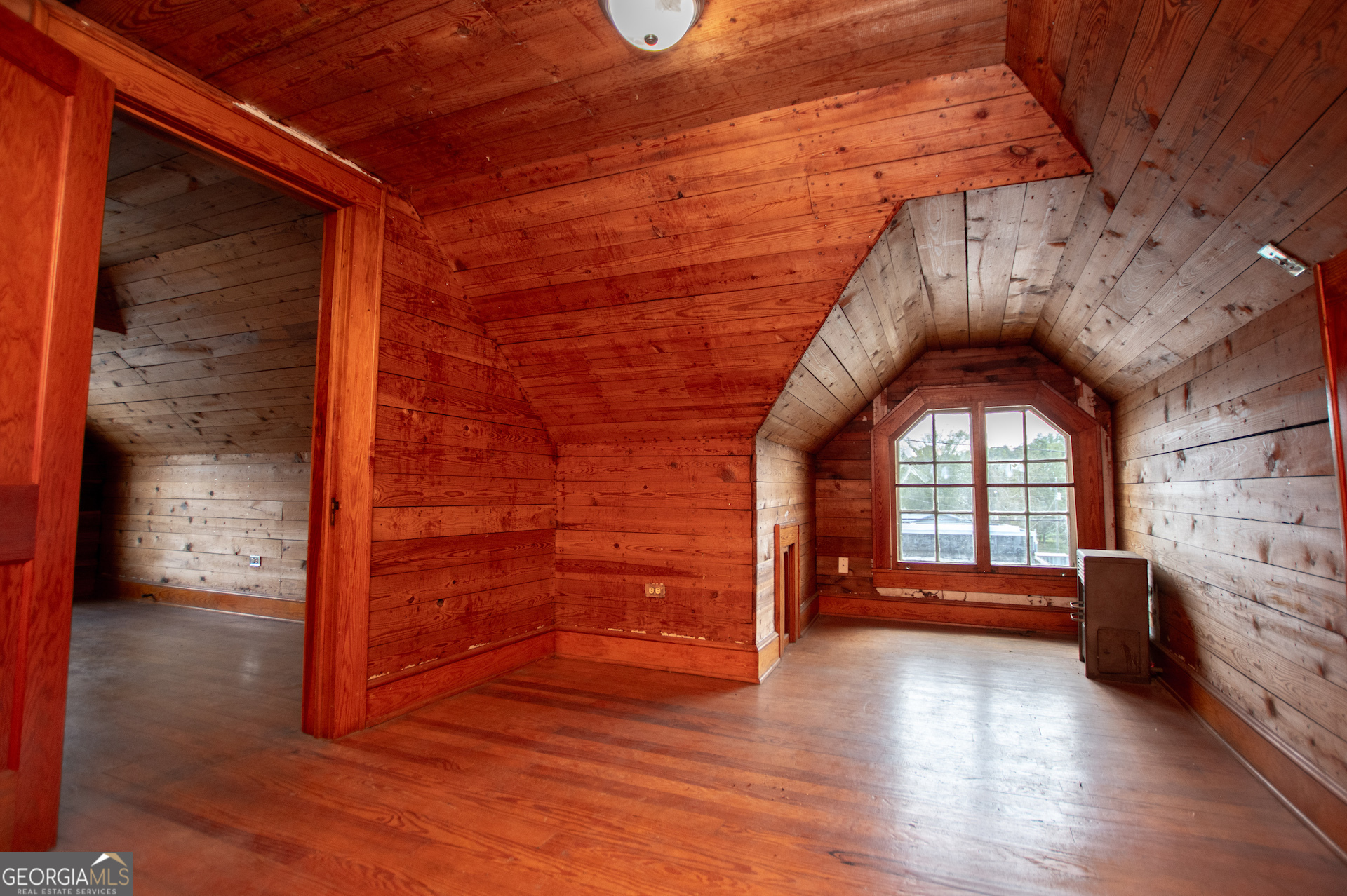 3608 Us Highway Buchanan, GA 30113 - Photo 39 of 92 a view of a hallway with a window and wooden floor