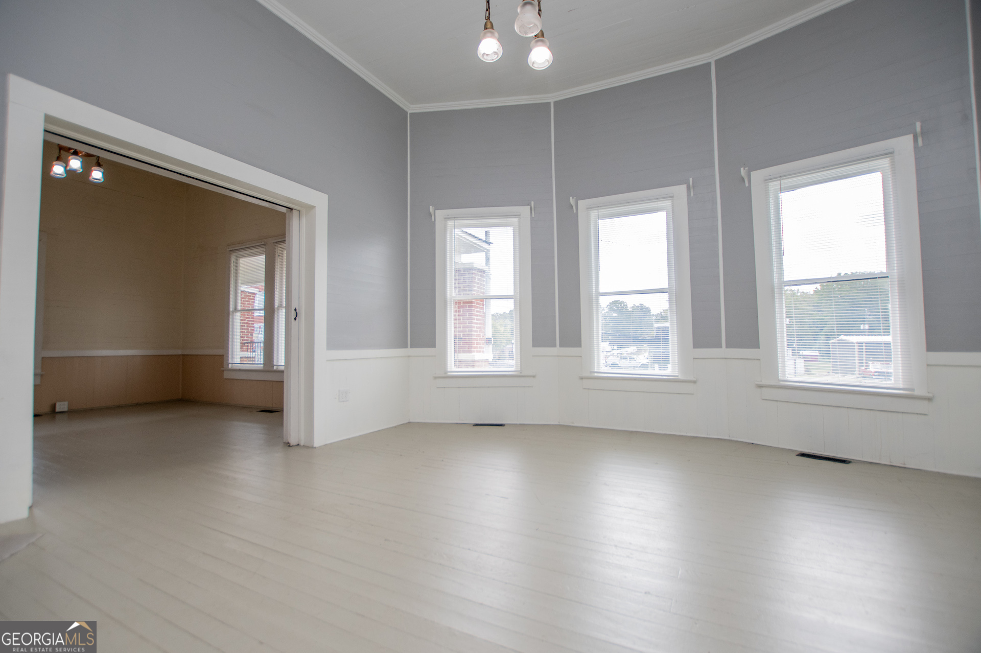 3608 Us Highway Buchanan, GA 30113 - Photo 49 of 92 a view of an empty room with a window and wooden floor