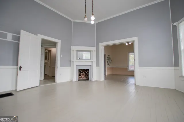 a view of a chairs and table in the patio