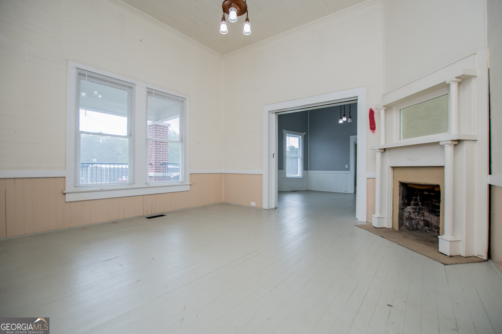 3608 Us Highway Buchanan, GA 30113 - Photo 56 of 92 wooden floor fireplace and windows in an empty room