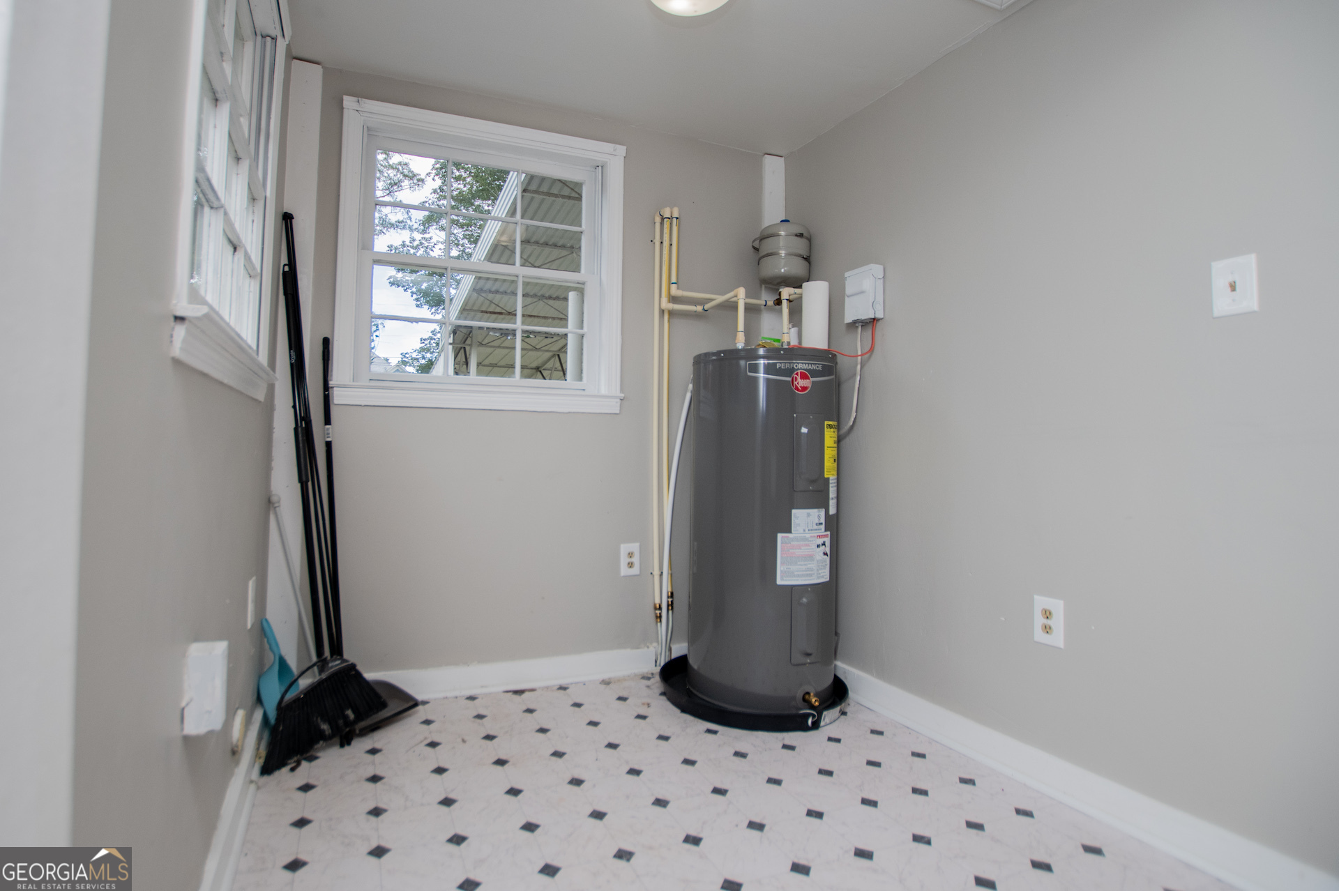 3608 Us Highway Buchanan, GA 30113 - Photo 67 of 92 a room with a window and a refrigerator