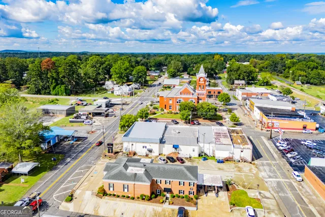 a view of a balcony with double door