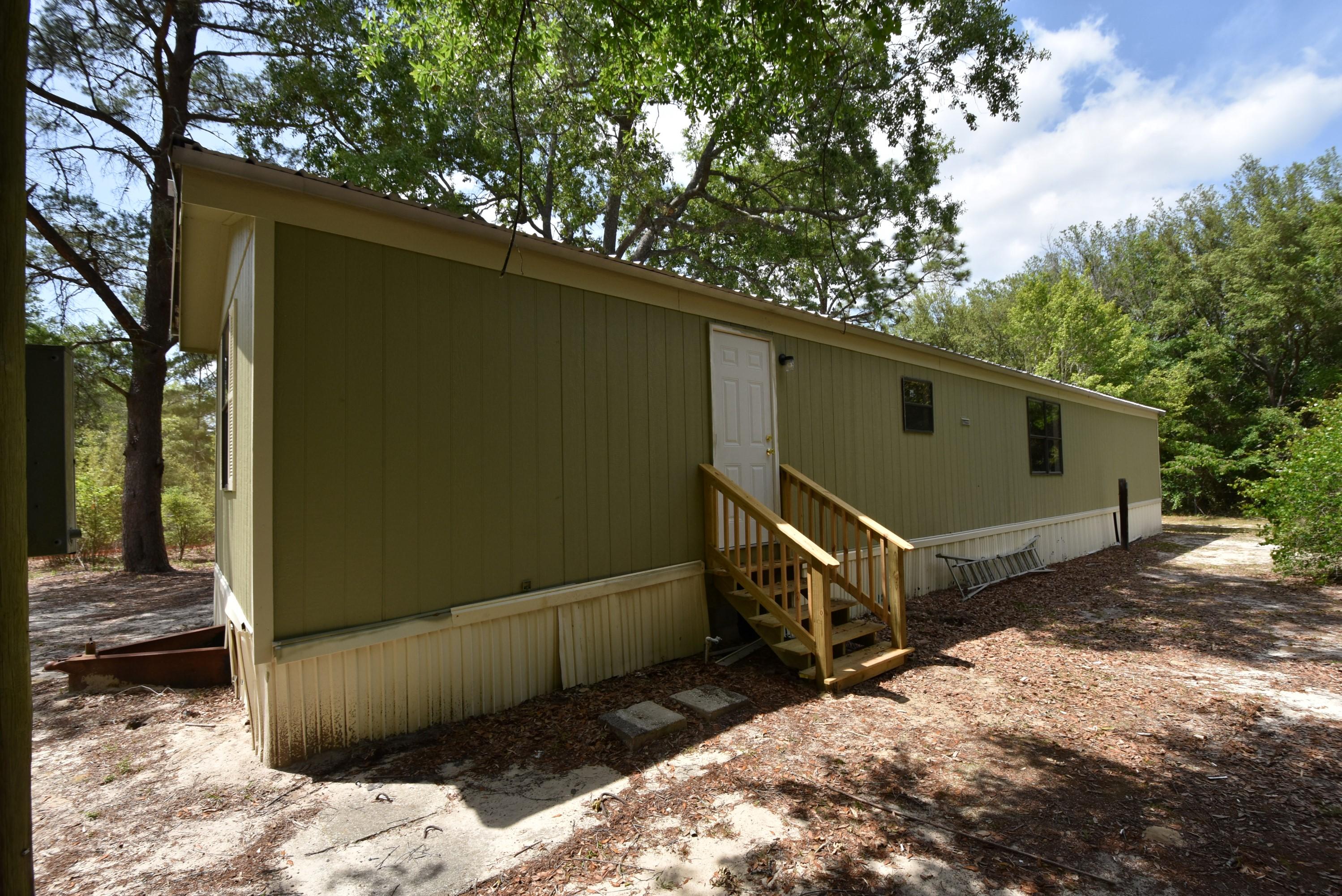 739 Roxy Lane Holt, FL 32564 - Photo 3 of 20 KBW_1975