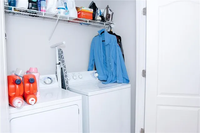 a utility room with dryer and washer