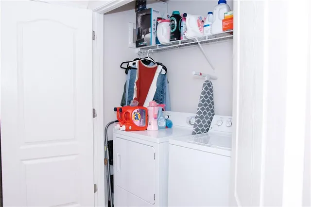 a utility room with dryer and washer