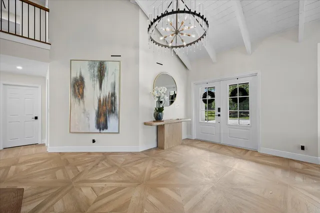 a view of kitchen with cabinets