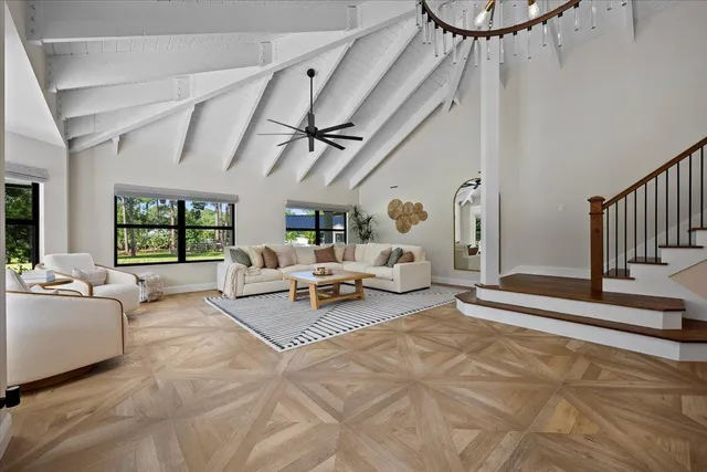 a living room with furniture and a table