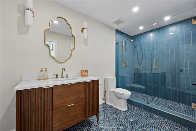 a view of a livingroom with furniture and a table