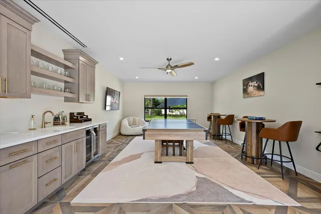 a spacious bathroom with a double vanity sink a mirror and a shower