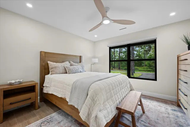 a utility room with cabinets washer and dryer