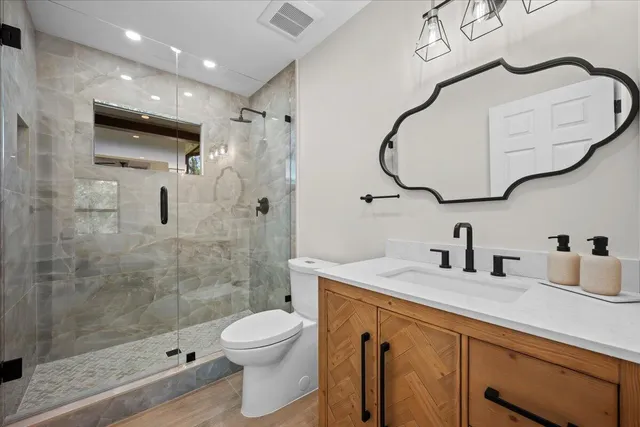 an aerial view of house with yard swimming pool and outdoor seating