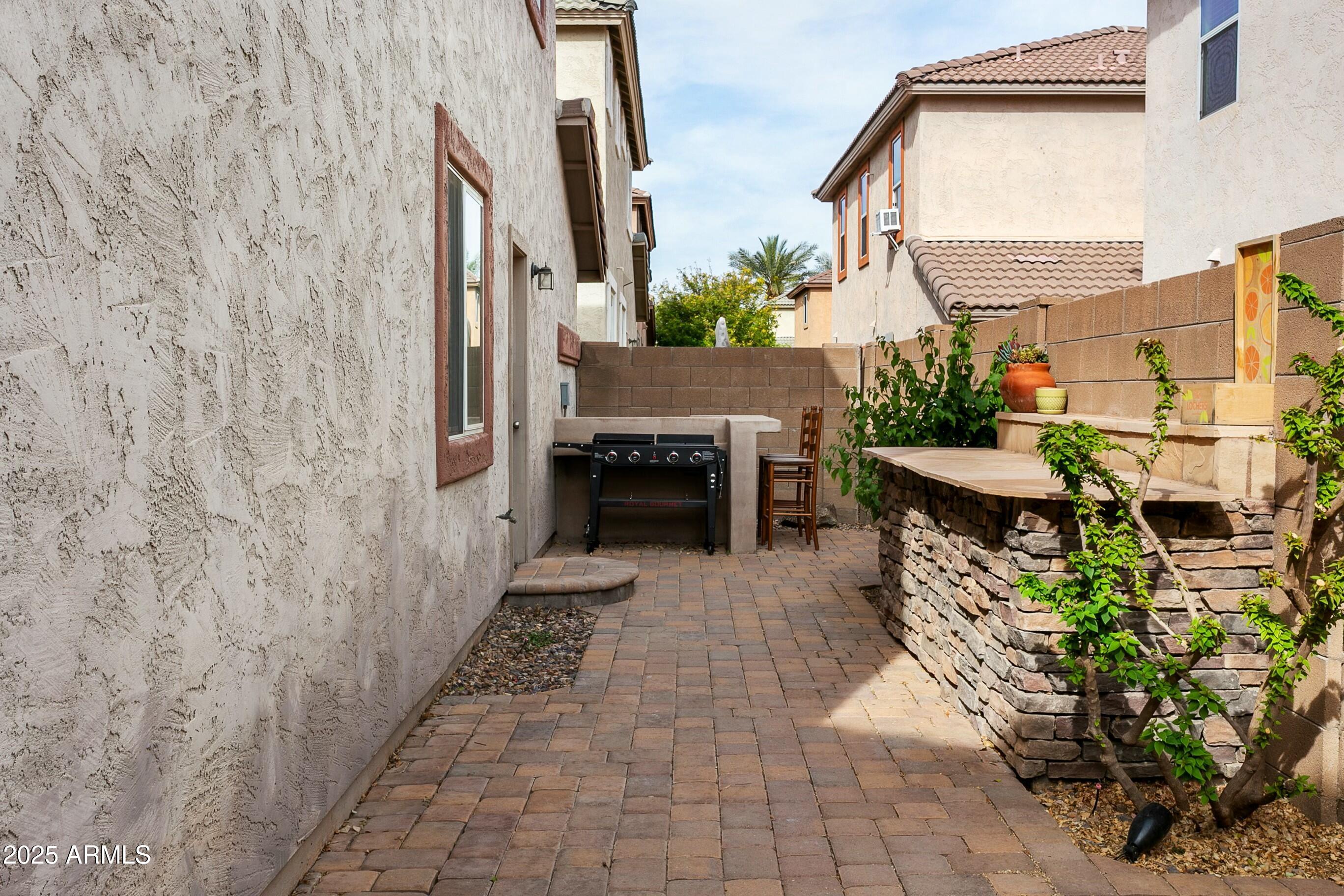 4136 East Tyson Street Gilbert, AZ 85295 - Photo 21 of 24 BBQ Space & Built-in Buffet