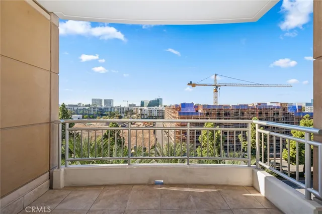 a view of a city skyline from a balcony