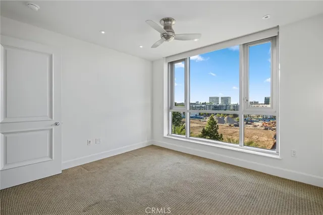 a large bathroom with a granite countertop tub sink shower and mirror