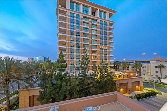 a living room with furniture potted plant and a window
