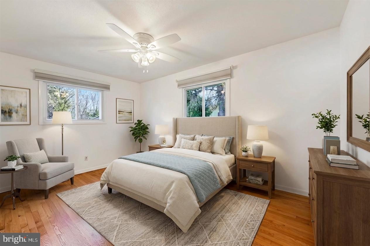 2926 Knoll Acres Drive Baltimore, MD 21234 - Photo 15 of 49 a bedroom with a bed and window
