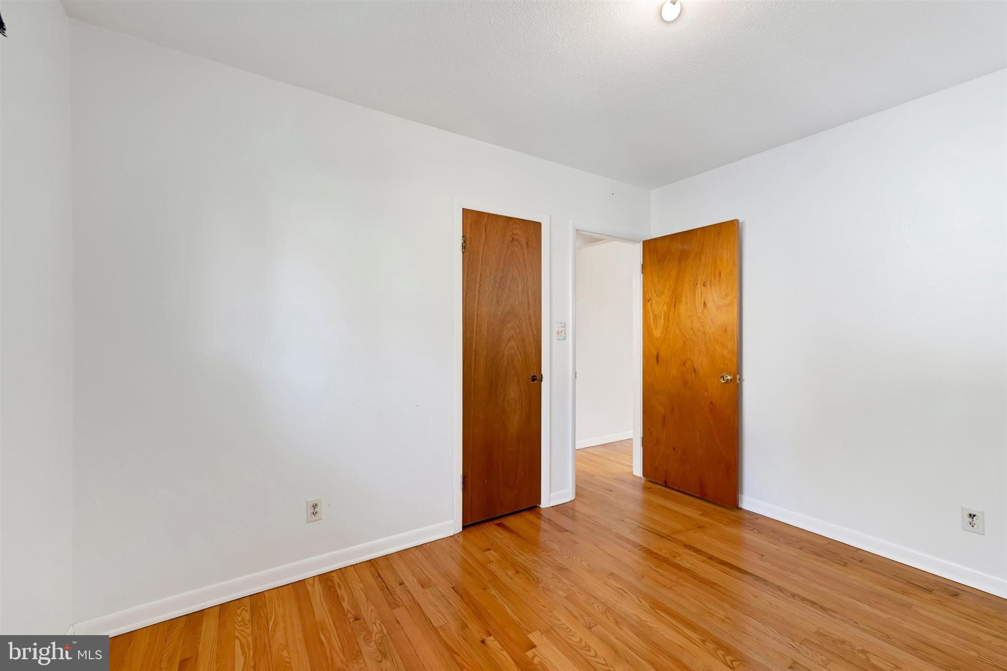 2926 Knoll Acres Drive Baltimore, MD 21234 - Photo 21 of 49 a view of an empty room with wooden floor