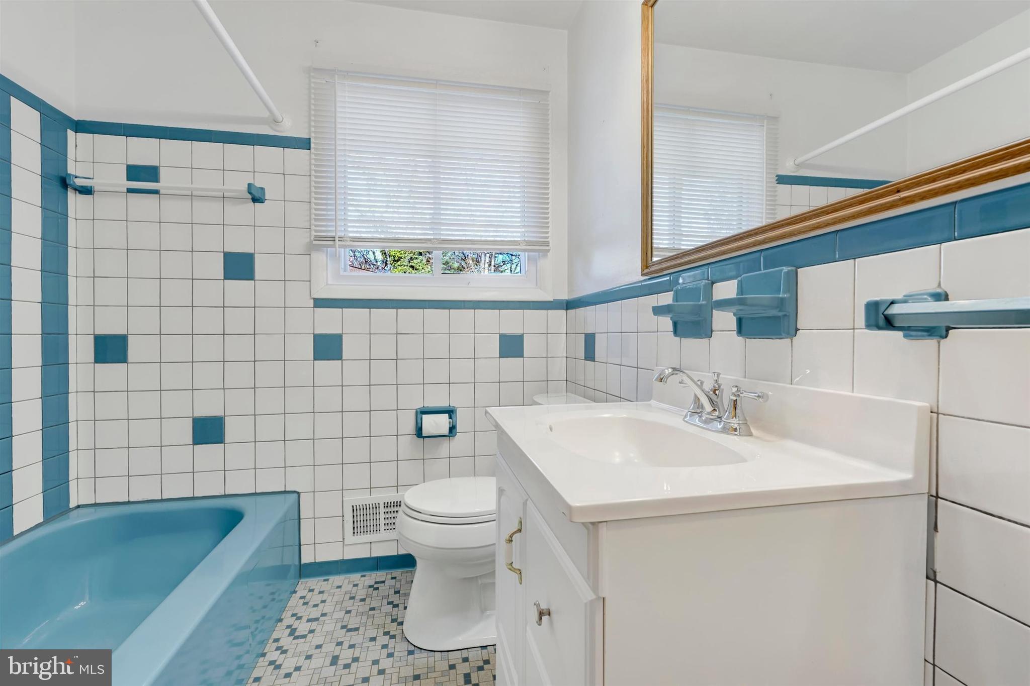 2926 Knoll Acres Drive Baltimore, MD 21234 - Photo 22 of 49 a bathroom with a sink toilet and shower