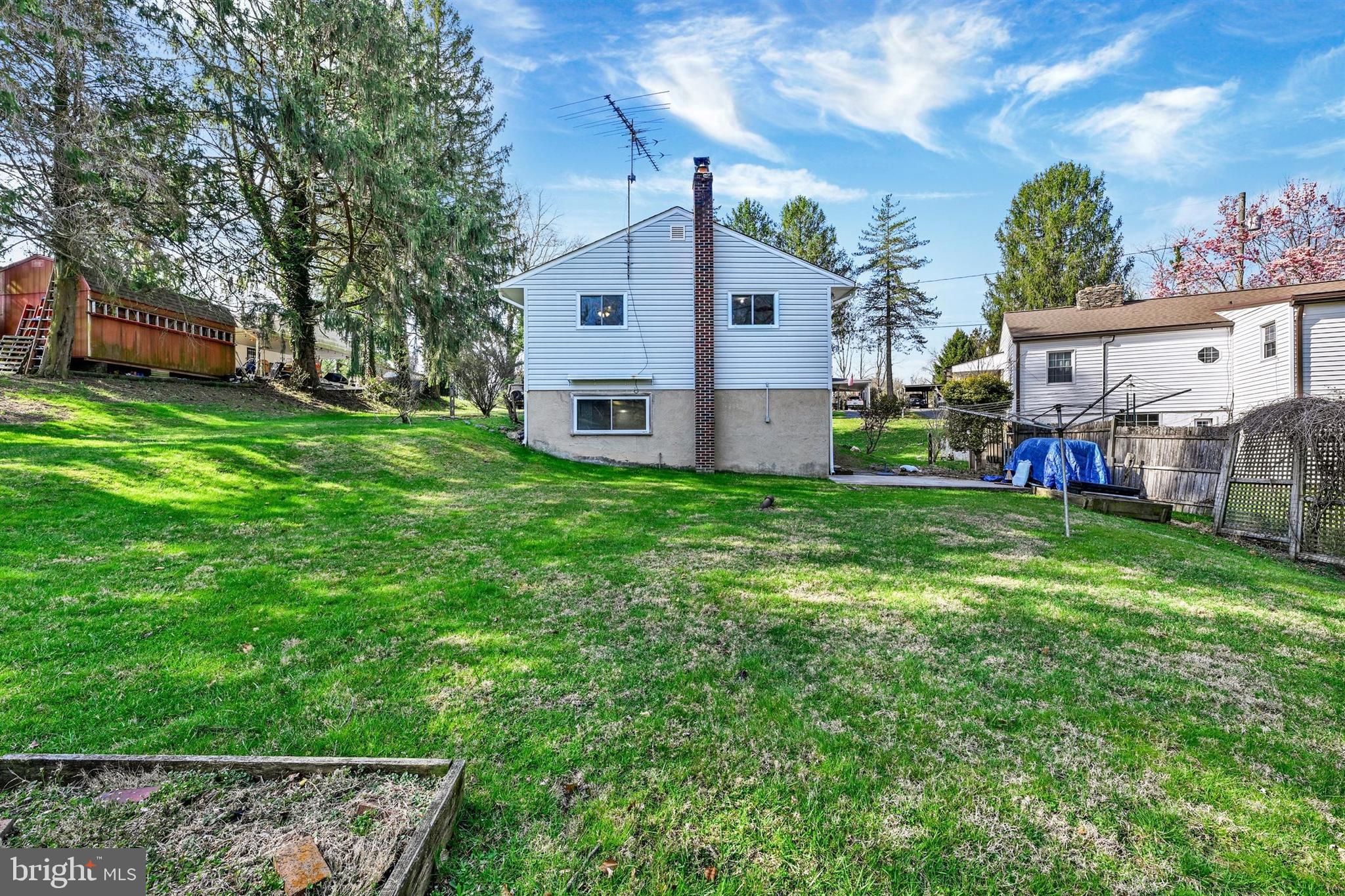 2926 Knoll Acres Drive Baltimore, MD 21234 - Photo 32 of 49 a view of backyard with a garden and plants