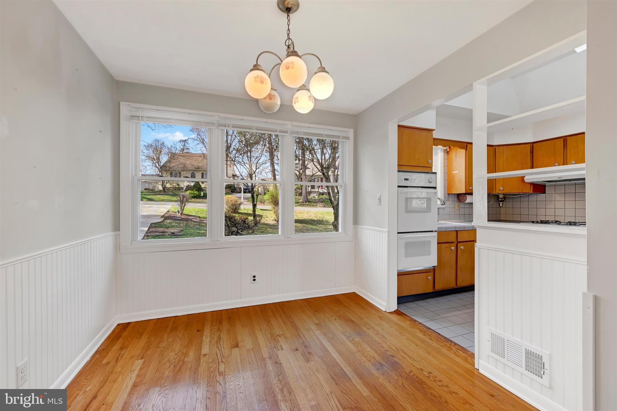 2926 Knoll Acres Drive Baltimore, MD 21234 - Photo 10 of 49 a view of a room with wooden floor and staircase
