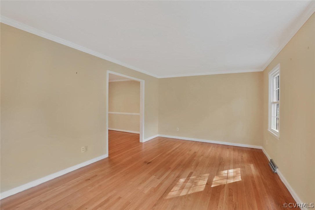 1607 Robindale Road North Chesterfield, VA 23235 - Photo 5 of 29 The living room is large with hardwood floors.