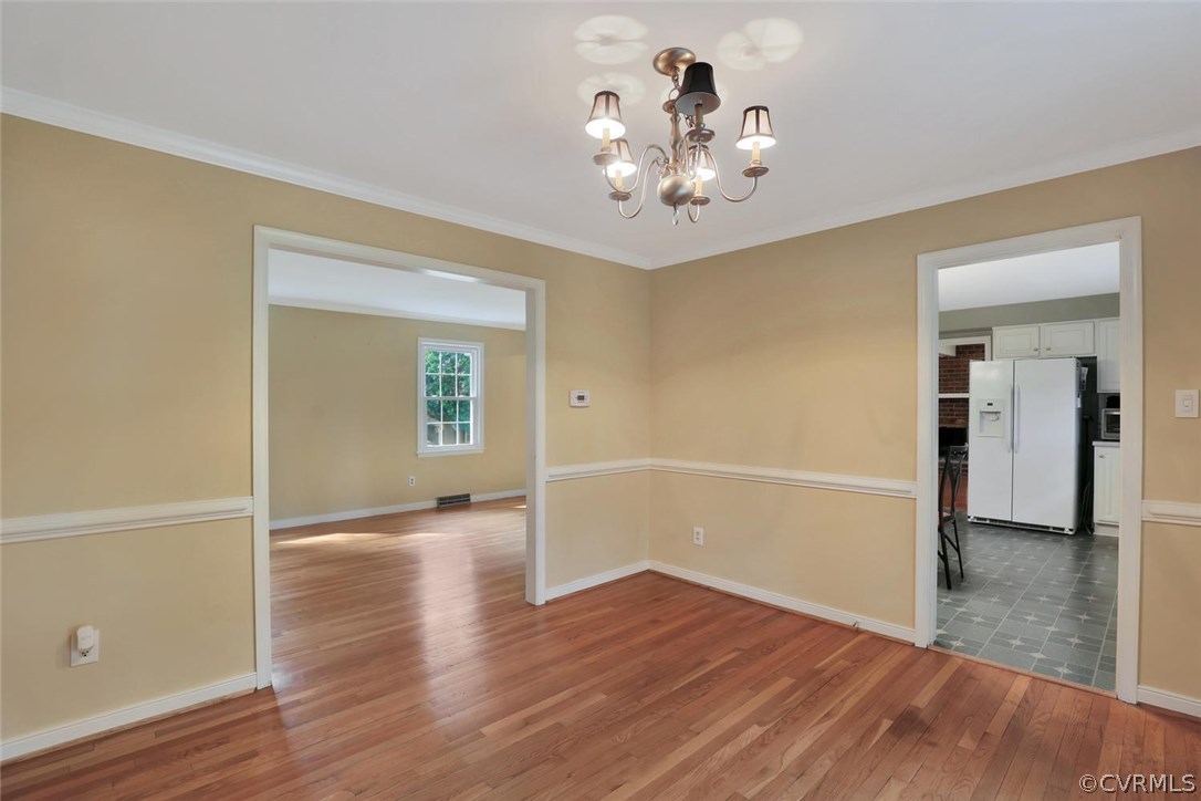 1607 Robindale Road North Chesterfield, VA 23235 - Photo 7 of 29 The dining room also has chair rail and crown moul