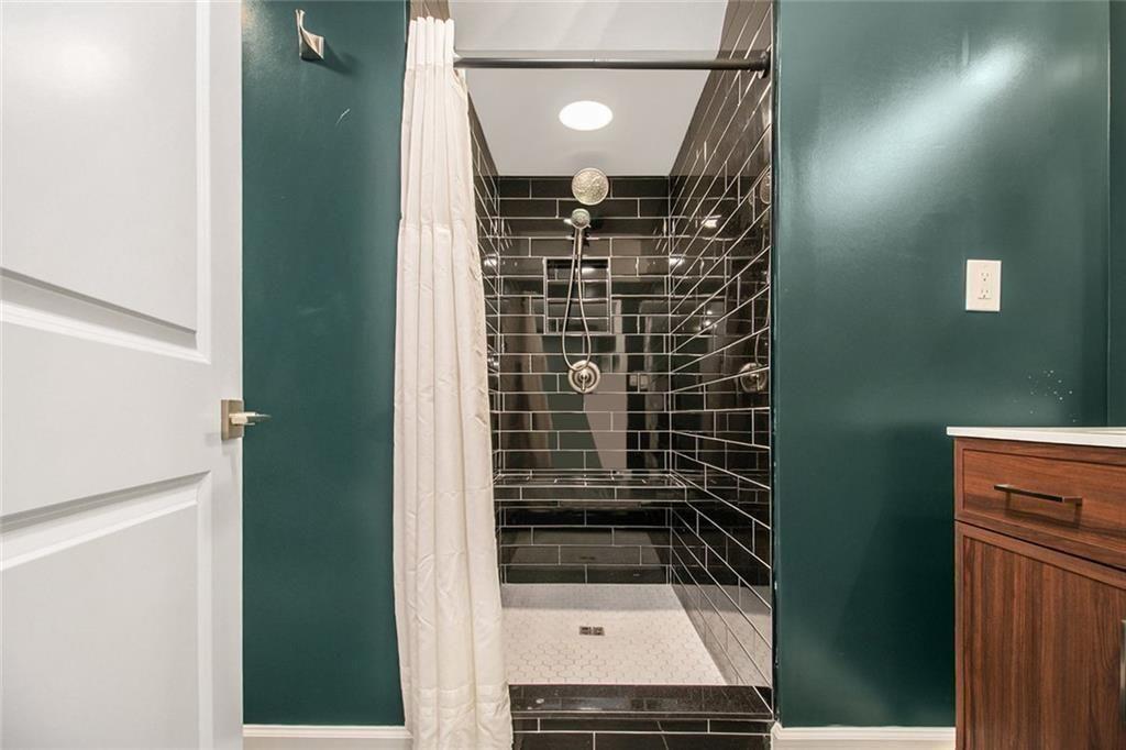 1723 Capistrana Place Decatur, GA 30032 - Photo 20 of 28 a bathroom with a mirror