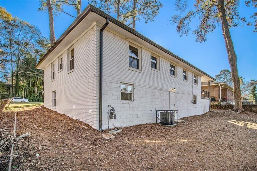1723 Capistrana Place Decatur, GA 30032 - Photo 26 of 28 a view of a house with a yard