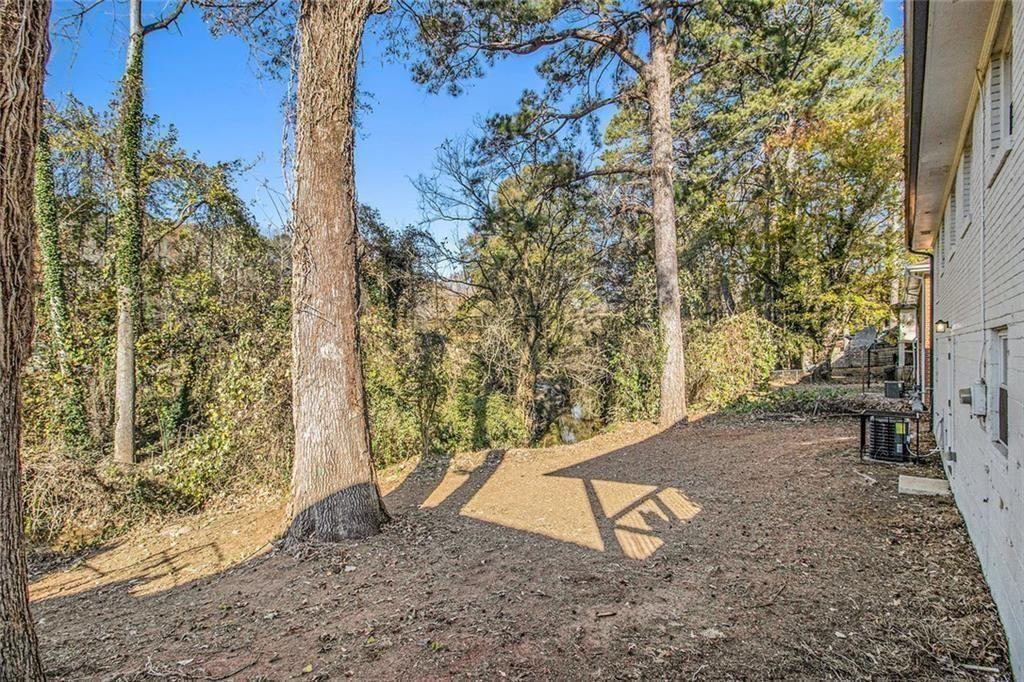 1723 Capistrana Place Decatur, GA 30032 - Photo 27 of 28 a view of a yard with a tree