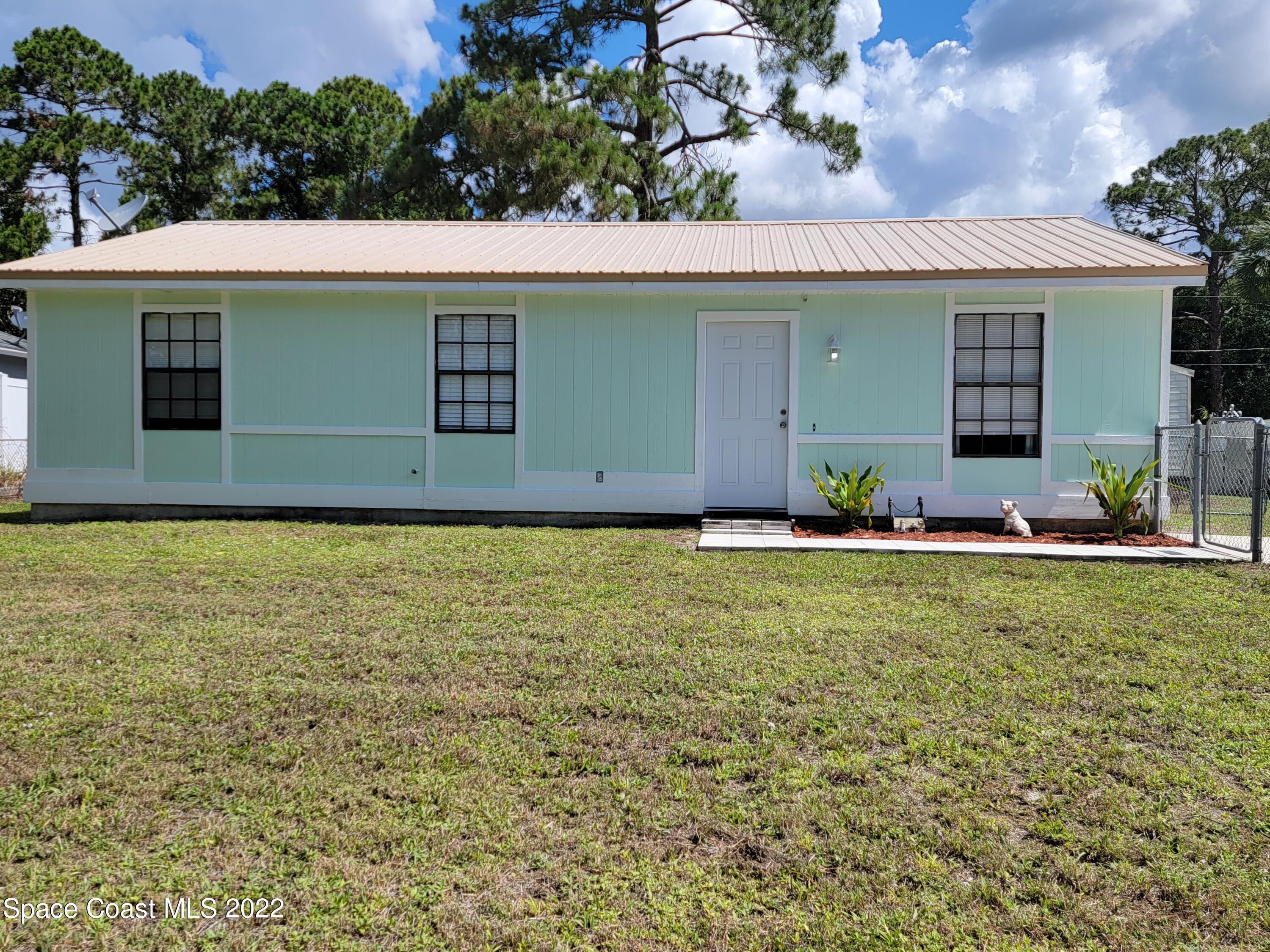 1435 Madison Road Northwest Palm Bay, FL 32907 - Photo 1 of 14 Front of Home