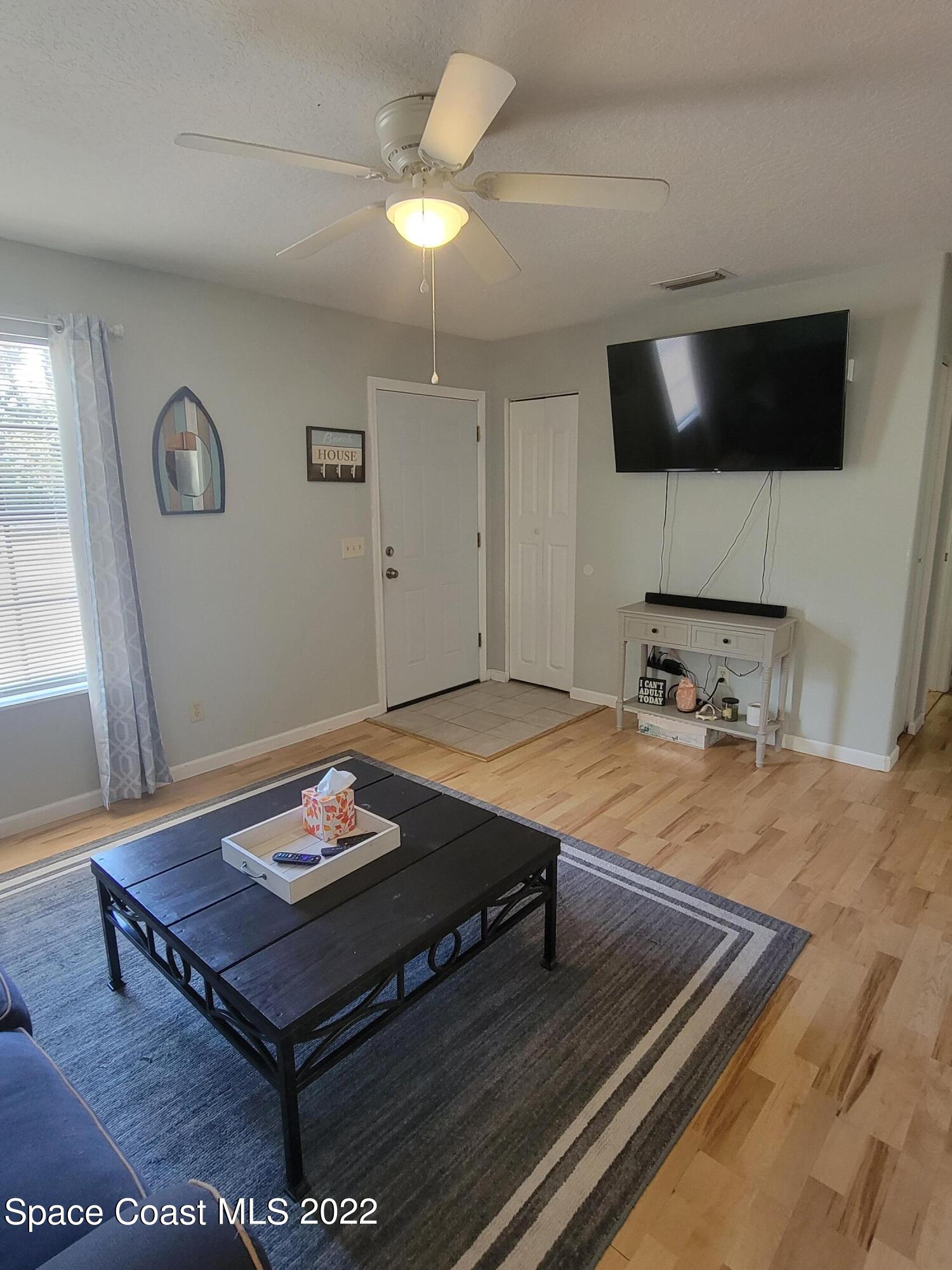 1435 Madison Road Northwest Palm Bay, FL 32907 - Photo 2 of 14 Living room 1